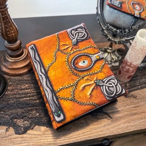 Oreiller pour livre de sorts