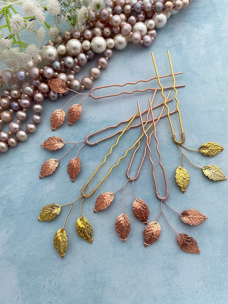 Hair pins with 3 or more decorative metallic leaves. Leaf hair pins in silver or rose gold or gold color are beautiful adornments for different hairstyle.