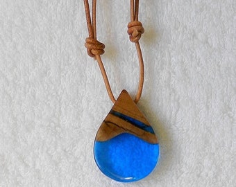 Olive wood and resin pendant with natural leather cord