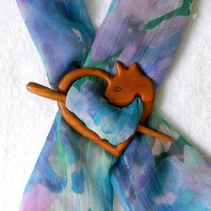 Cat-shaped shawl pin brooch made with solid cherry wood.