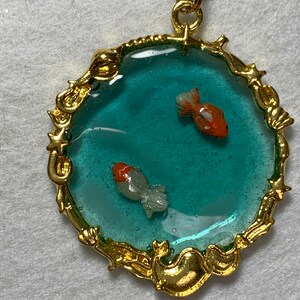 Resin cast goldfish pond necklace