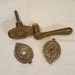 1920s salvage antique door knobs, ornate brass design