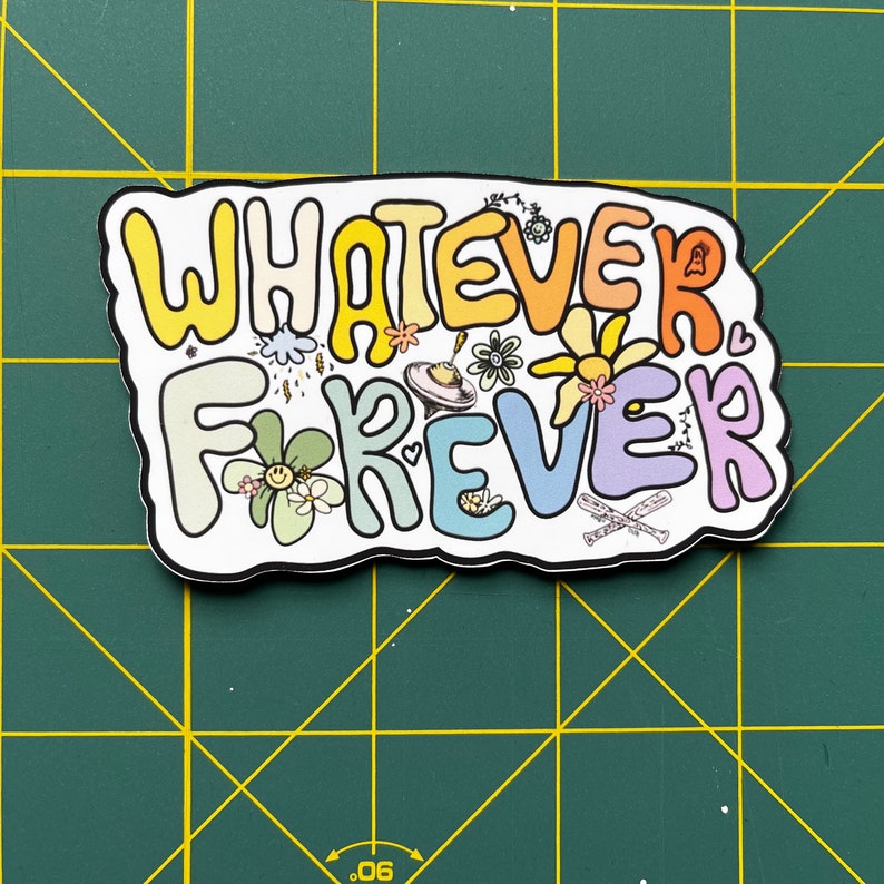 Puede incluir: Una pegatina con el texto "Whatever Forever" en colores arco&iacute;ris con una variedad de peque&ntilde;as ilustraciones que incluyen flores, estrellas y un platillo volante.