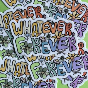 Puede incluir: Una pegatina con el texto "Whatever Forever" en colores arco&iacute;ris con una variedad de flores y otros dise&ntilde;os.