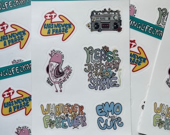 May include: A set of nine stickers featuring colorful illustrations and text. The stickers include phrases like "It was never a phase", "Please just stay the same", "Whatever forever", and "Emo and cute".