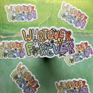 Puede incluir: Una pegatina colorida con el texto "Whatever Forever" en una fuente caprichosa. La pegatina est&aacute; decorada con flores, corazones y otros dise&ntilde;os divertidos.