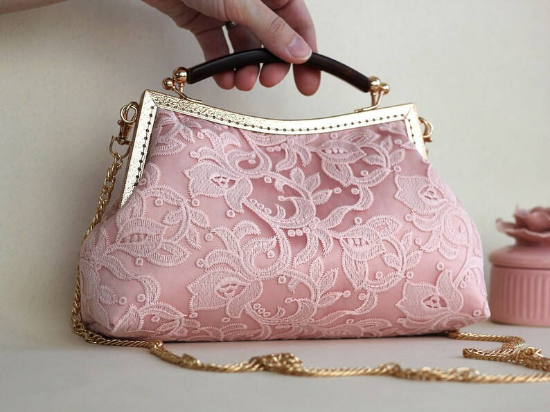 coral pink clutch bag