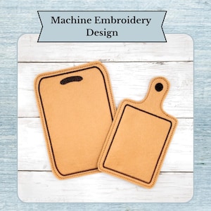May include: Two tan-colored cutting board designs with dark brown stitched edges. One is rectangular, the other has a handle. The text "Machine Embroidery Design" is above the cutting boards.