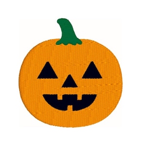 May include: A smiling orange jack-o'-lantern with a green stem and black eyes, nose, and mouth.
