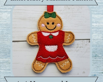 May include: Embroidered gingerbread person ornament in red, brown, and green with a white apron. The ornament is 4x4 hoop and larger. "Embroidery Machine Pattern" is written at the top of the image and "4x4 Hoop and Larger" is written at the bottom.