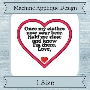 May include: Machine applique design featuring a red heart with the text "Once my clothes now your bear. Hold me close and know I'm there. Love," in black text.