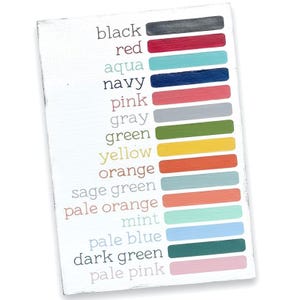 May include: A white rectangular color chart featuring a list of color names in black text, each paired with a corresponding horizontal paint swatch. The colors include black, red, aqua, navy, pink, gray, green, yellow, orange, sage green, pale orange, mint, pale blue, dark green, and pale pink.