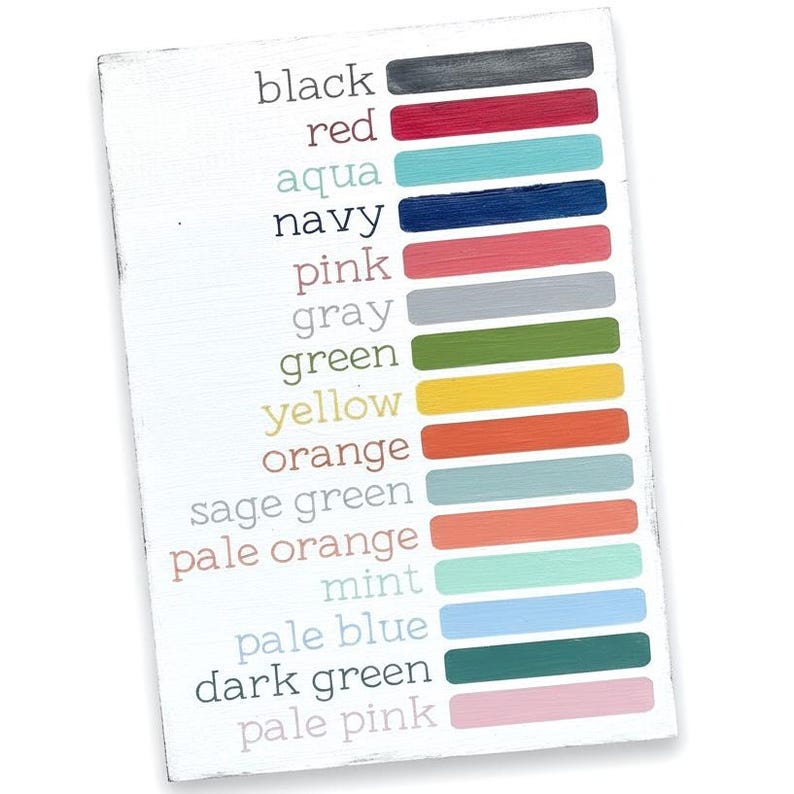 May include: A white rectangular color chart featuring a list of color names in black text, each paired with a corresponding horizontal paint swatch. The colors include black, red, aqua, navy, pink, gray, green, yellow, orange, sage green, pale orange, mint, pale blue, dark green, and pale pink.