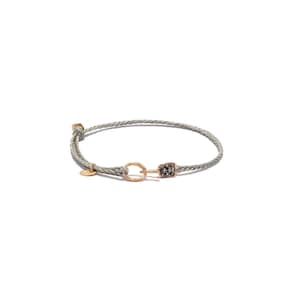 May include: A light grey braided cord bracelet featuring a circular gold-toned metal link, a small gold-toned circular charm, and a rectangular gold-toned metal component encrusted with small dark stones, secured with a sliding knot closure.