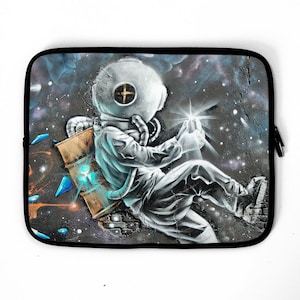 May include: A black and white illustration of an astronaut floating in space. The astronaut is wearing a helmet and holding a small, glowing object. The background is a dark blue with stars.