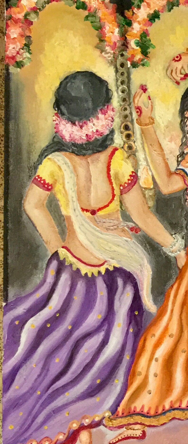 May include: Painting of two women in traditional Indian clothing. The woman in the foreground is wearing a purple skirt with gold dots, a yellow blouse with red trim, and a white shawl. The woman in the background is wearing an orange skirt with red trim and a white blouse.