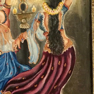 May include: A painting of two women in traditional Indian clothing dancing under a floral garland. The woman in the foreground is wearing a burgundy skirt with gold accents and a blue top. The woman in the background is wearing a blue skirt with gold accents and a white top.