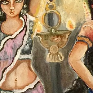 May include: A painting of two women in traditional Indian clothing, standing in front of a lit oil lamp. The women are wearing colorful saris and jewelry. The lamp is hanging from a chain and has a mirror on the side. The background is a dark blue.