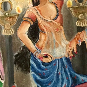 May include: A painting of a woman in a blue and gold sari, with her arms raised and hands in a dance pose. She is wearing jewelry and has a flower garland around her head. The background is a light yellow with a floral garland.