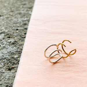 Removable nose ring top