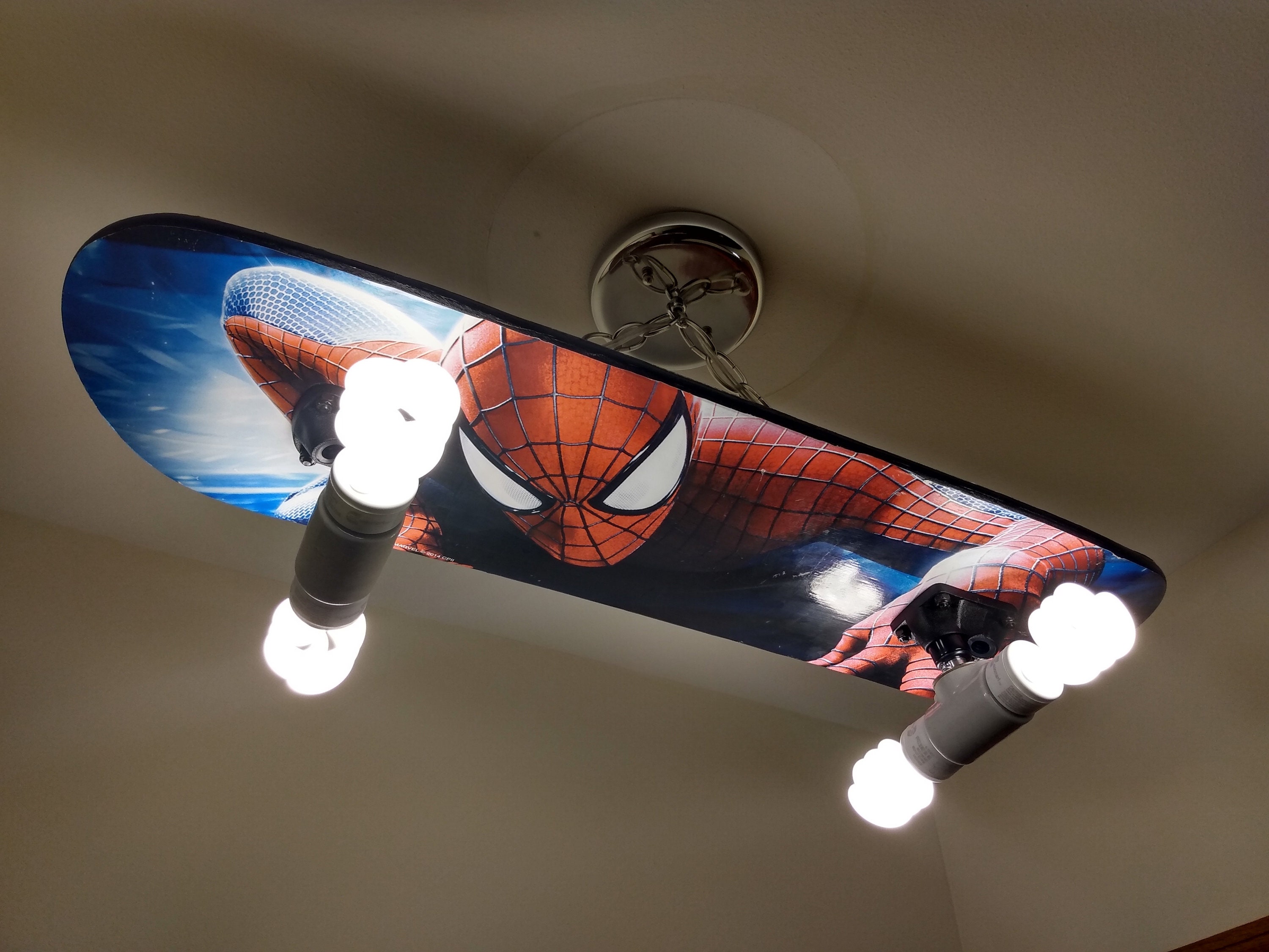 electric spiderman skateboard