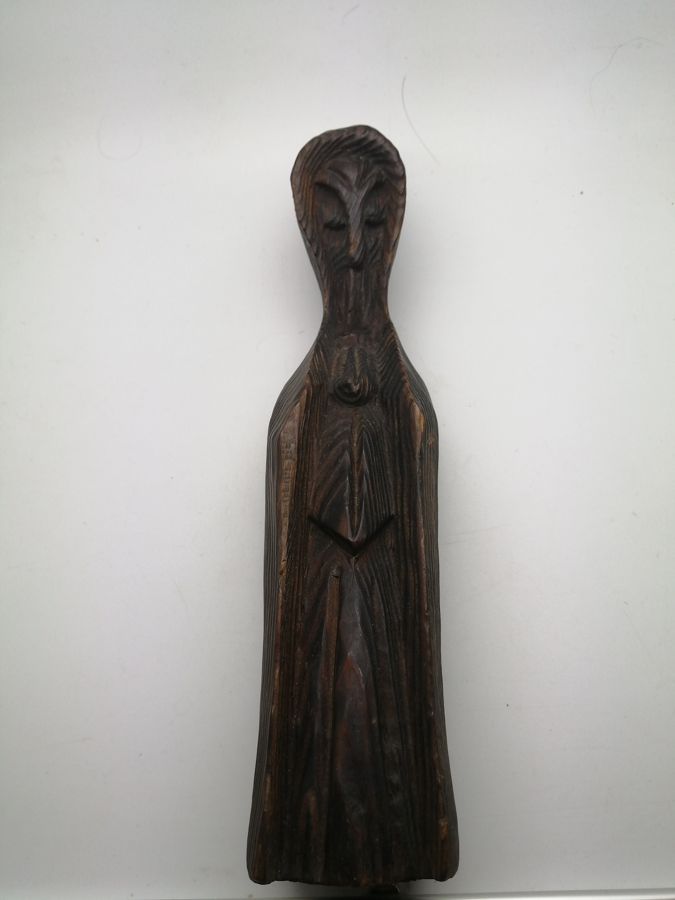 statuette d'un Figure Masqué