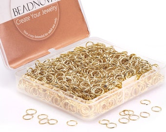 May include: A clear plastic container filled with gold jump rings. The container has a label that reads "BEADNOVA Create Your Jewelry Not a toy-Intended for adult use only."