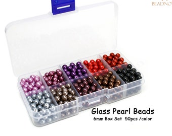 Perle Di Caduta Di Cristallo Sfaccettate E Spiagge Naturali Rotonde Su Fili Sfondo Rosa Pietra Naturale Sui 216872582 - Foto 11