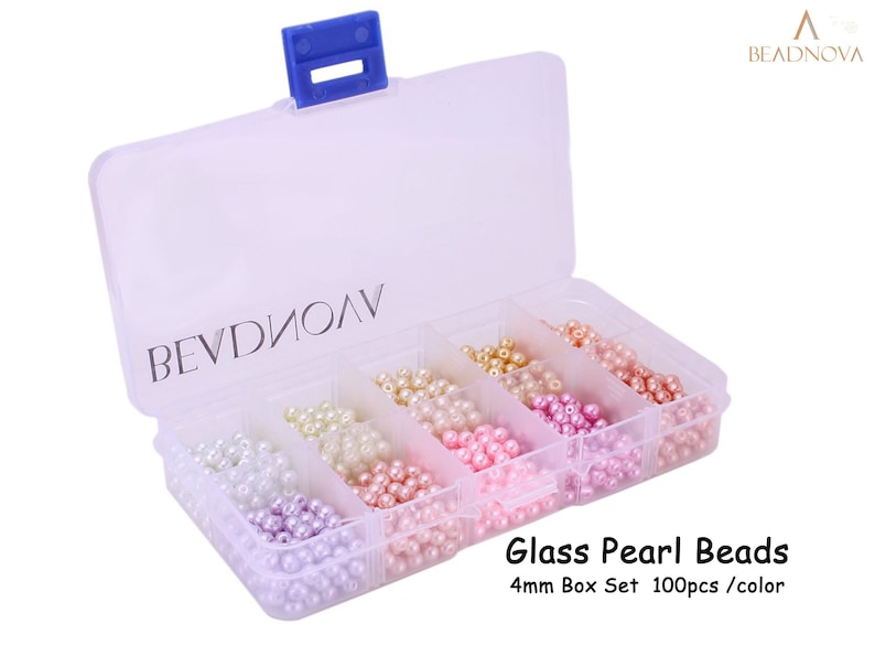May include: A clear plastic box with a blue clasp, filled with various colors of 4mm glass pearl beads. The box is divided into compartments containing white, light green, cream, pink, and lavender beads. Text on the image reads "Glass Pearl Beads".