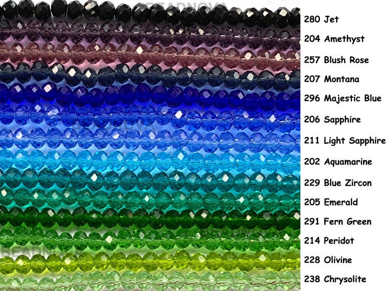 May include: Strands of faceted crystal beads in a gradient of colors, including black, purple, blue, and green. The image includes text labels for each color, such as "Jet," "Amethyst," and "Emerald."