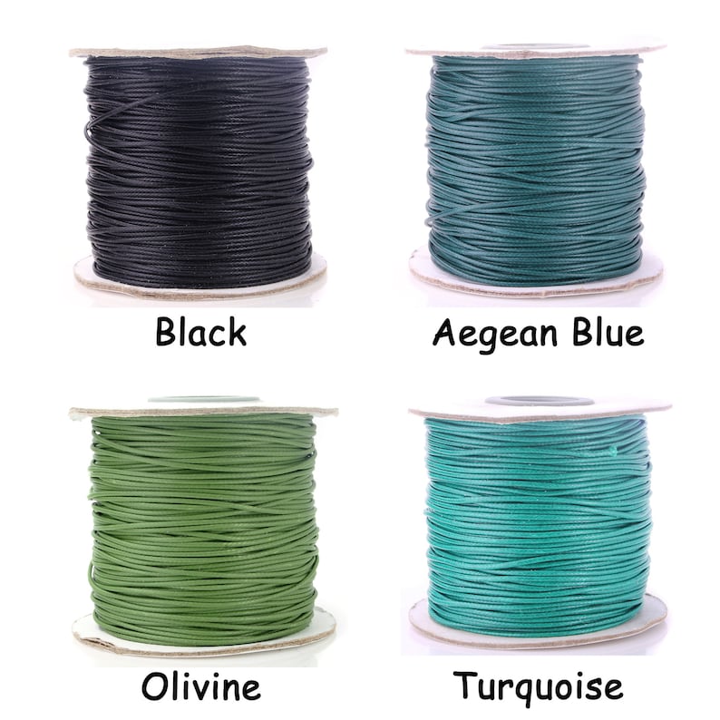 May include: Four spools of waxed cotton cord in different colors: black, Aegean blue, olive green, and turquoise.