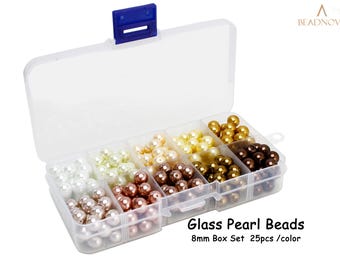 May include: A clear plastic box with a blue clasp, filled with various colors of 8mm glass pearl beads. Colors include white, cream, bronze, gold, and brown. Text on the image reads "Glass Pearl Beads 8mm Box Set 25pcs / color."