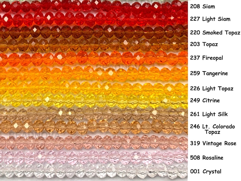 May include: A collection of faceted crystal beads in various colors, including red, orange, yellow, and pink. The beads are strung together, with each strand displaying a different hue. The image also includes text labels for each color, such as "Siam" and "Crystal."