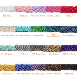 May include: A collection of twenty strands of round beads in various colours, labelled #01 through #20. The colours include white, pink, light purple, rose pink, red, milk white, aquamarine, peridot, aqua bohemica, sapphire, turquoise, grey, deep grey, brown, amethyst, yellow, capri blue, tanzanite, deep brown, and black.