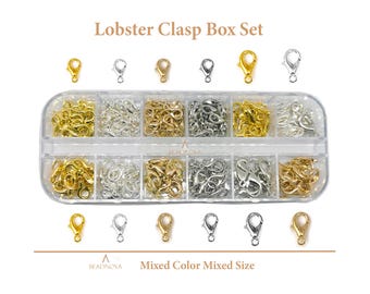 May include: A box of assorted gold, silver, and mixed color lobster clasps. The box has 8 compartments, each filled with clasps of different sizes. The text "Lobster Clasp Box Set" is at the top of the image. The text "Mixed Color Mixed Size" is at the bottom of the image.