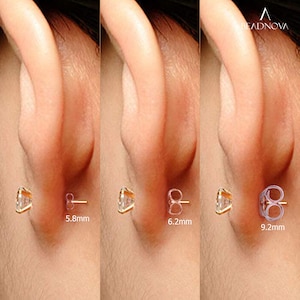 May include: Three images showing the size of a clear cubic zirconia earring on a model's ear. The earrings are 5.8mm, 6.2mm, and 9.2mm in size.