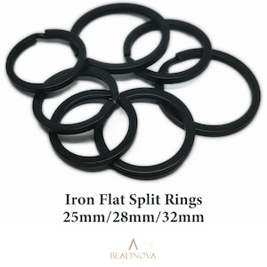 May include: A group of six black iron flat split rings in three sizes: 25mm, 28mm, and 32mm.  Iron Flat Split Rings 25mm/28mm/32mm