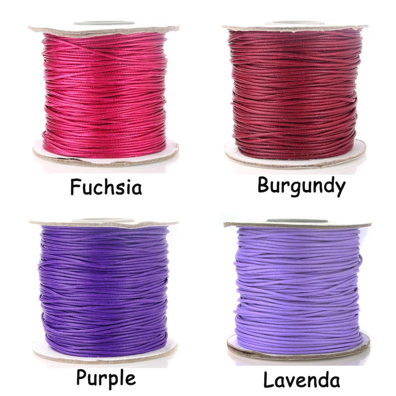 May include: Four spools of waxed cotton cord in different colors: fuchsia, burgundy, purple, and lavender.