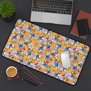 May include: A rectangular mousepad featuring a colorful pattern of Winnie the Pooh and friends. The design includes characters like Pooh, Tigger, Piglet, and Eeyore on a yellow, blue, and pink background. A white computer mouse rests on the pad.