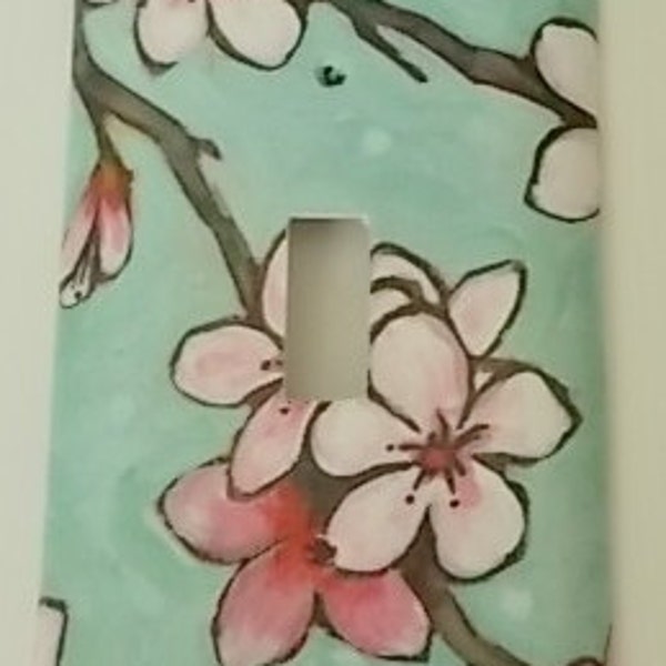 Switchplate cover, switch plate cover, light switch cover,
