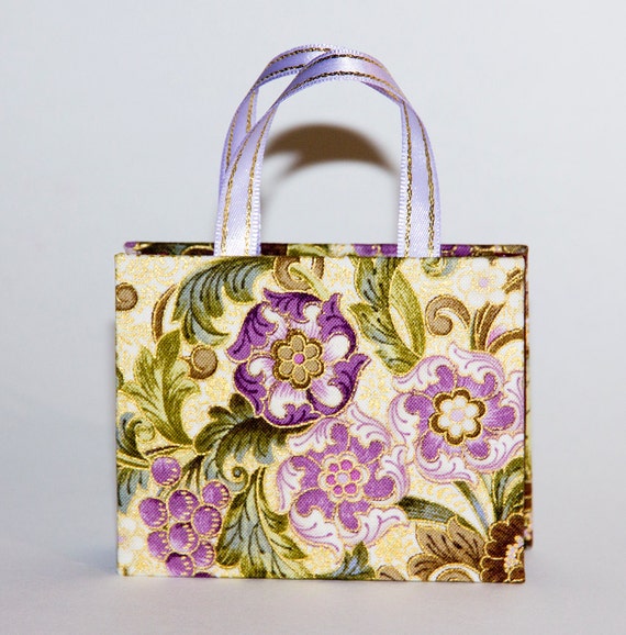 Items similar to Lovely handmade gift bag with a warm floral fabric on Etsy