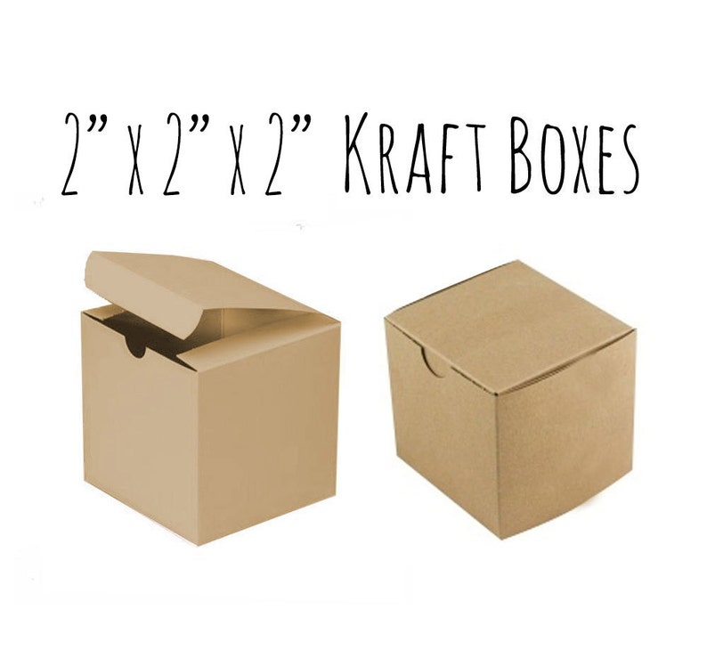 May include: Two 2" x 2" x 2" kraft paper boxes. One box is open, showing the inside. The boxes are made of brown cardboard.