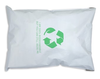 May include: White mailing envelope with a green recycling symbol and the text "I AM 100% BIODEGRADABLE BUT YOU CAN STILL REUSE ME."