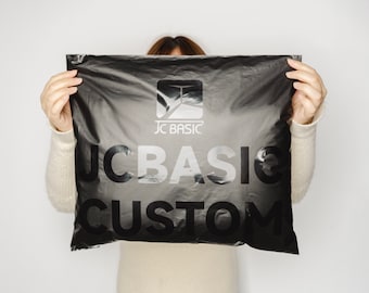 May include: A black plastic mailing bag with the text "JC BASIC CUSTOM" printed in white.