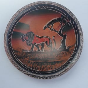 Lion /African wild animals Kisii stone bowl from Kenya Africa