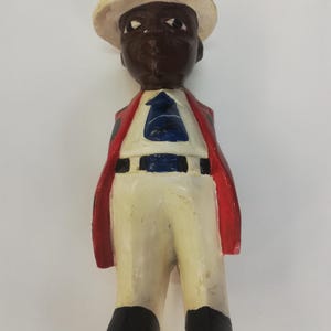 Colonial figure hand carved in Africa