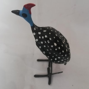 Guinea fowl made of wire and podshell from Zimbabwe