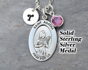 18-Inch Rhodium Plated Necklace with 6mm Light Rose Birthstone Beads and Sterling Silver Saint Scholastica Charm. 