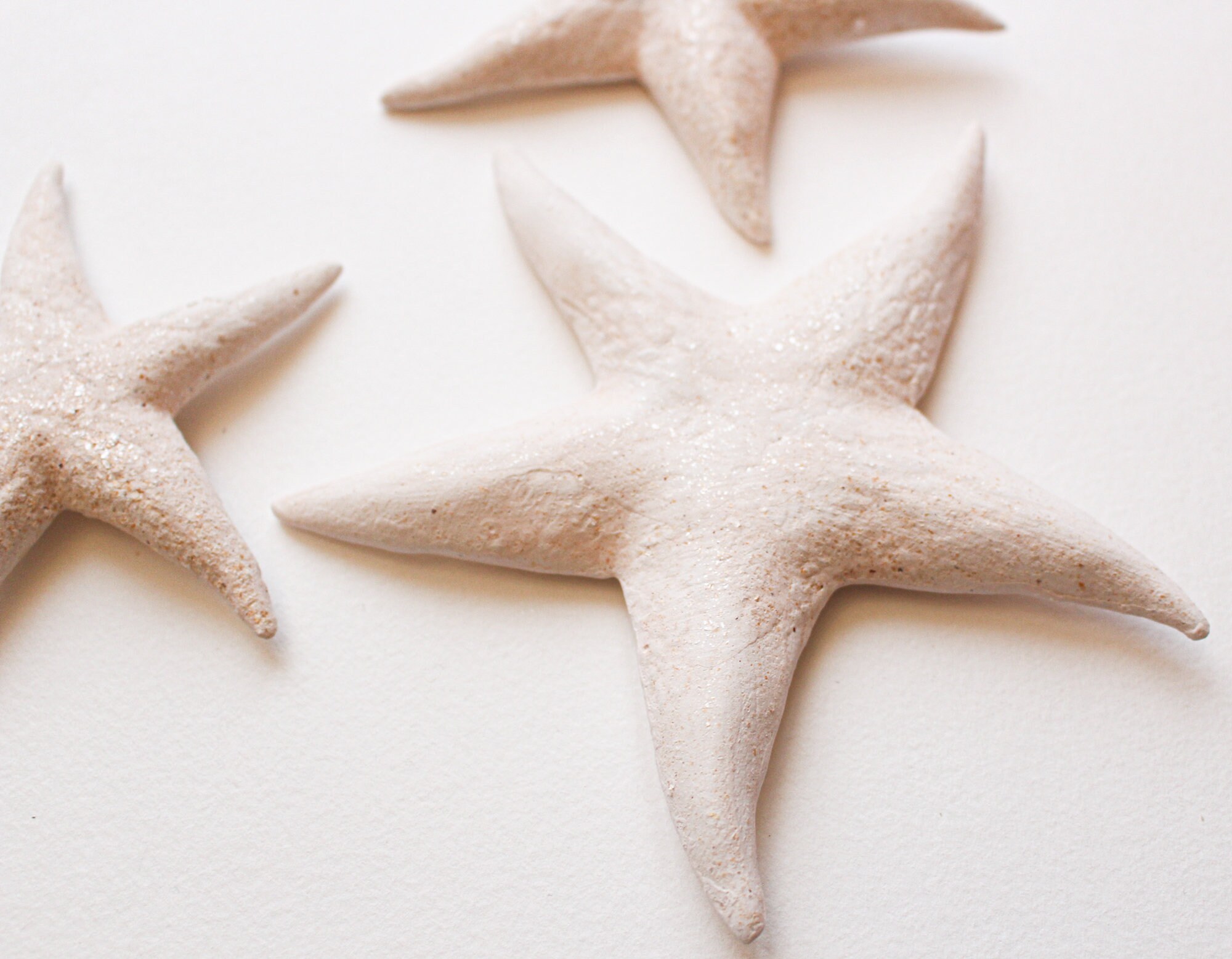 Décor Mural de 3 Étoiles Mer en Céramique Effet Sablé