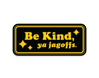 May include: Black rectangle sticker with yellow text that reads "Be Kind, ya jagoffs." and two yellow stars on either side of the text.